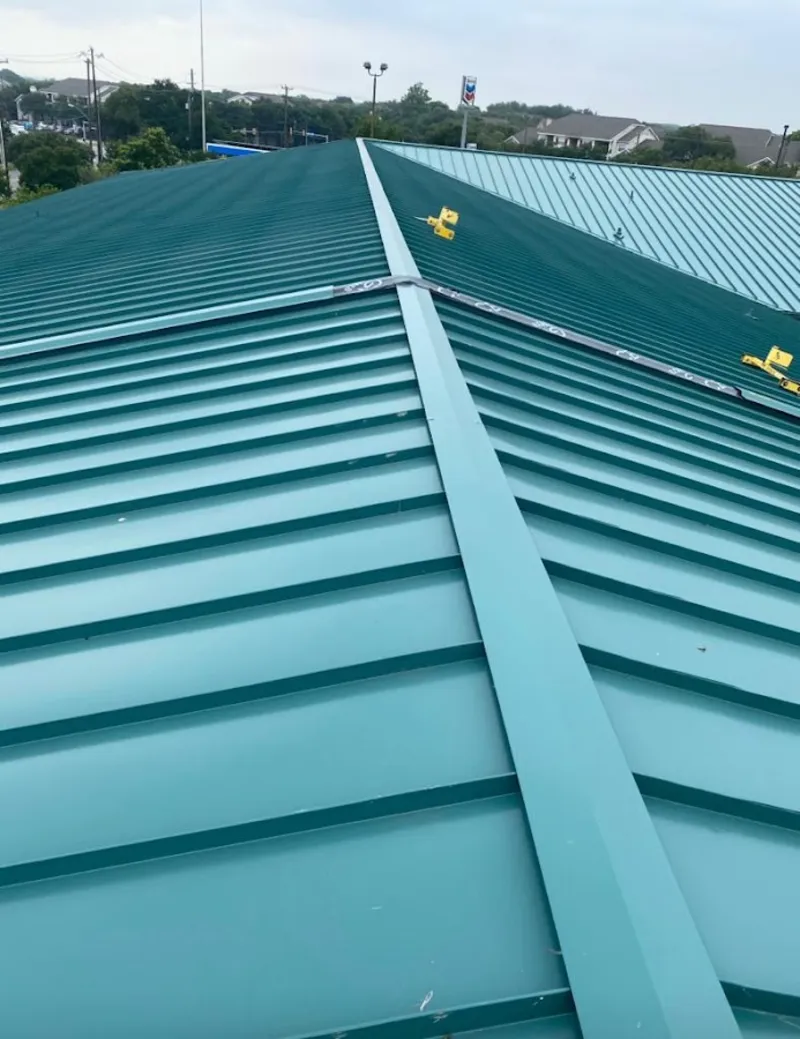 Green commercial metal roof ridge and valley for Metal Roof Repair in Triana